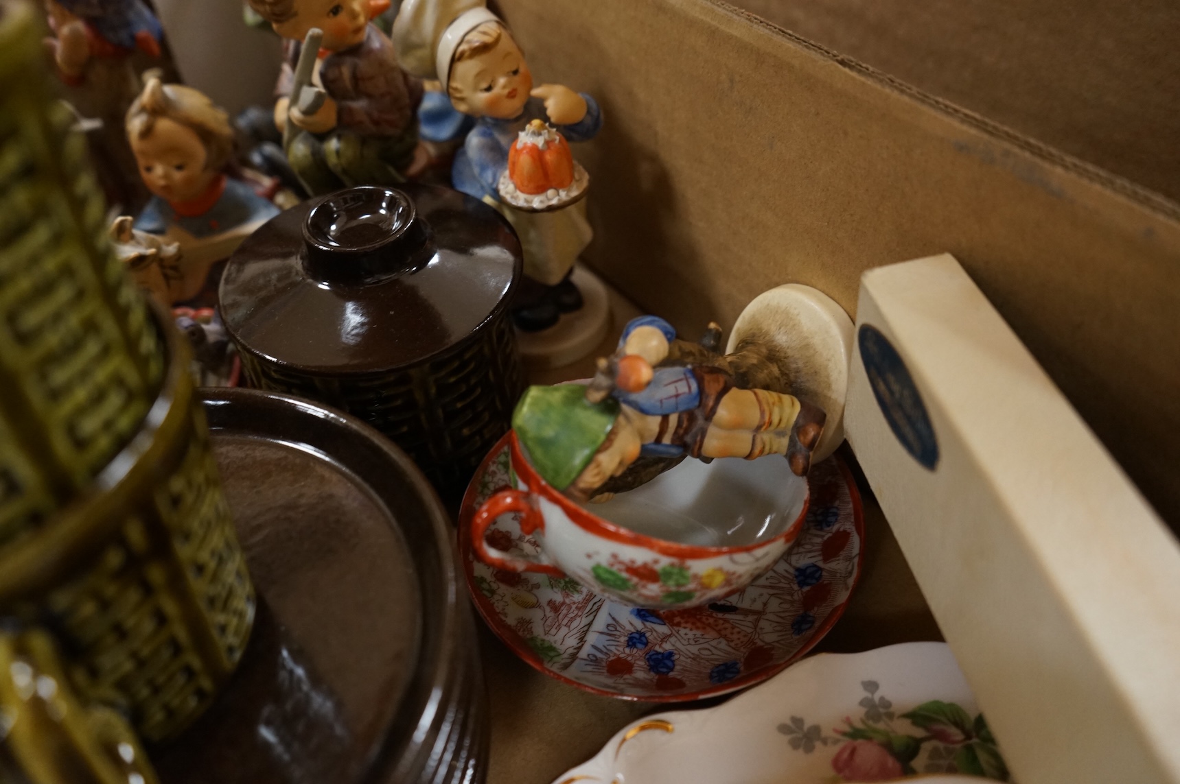 A collection of ceramics to include Doulton Toby jugs, Goebel figurines and Adderley part tea set